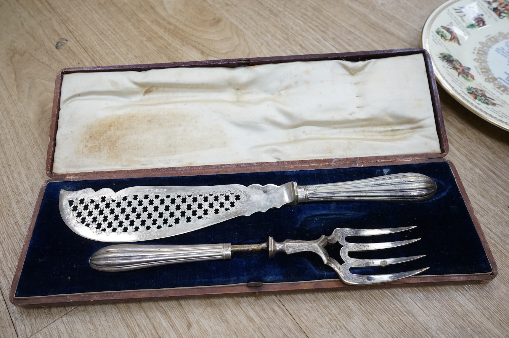 A quantity of plated cutlery, a Royal Doulton limited series sporting mug by Teofani and an Aynsley plate, 27.5cm diameter.